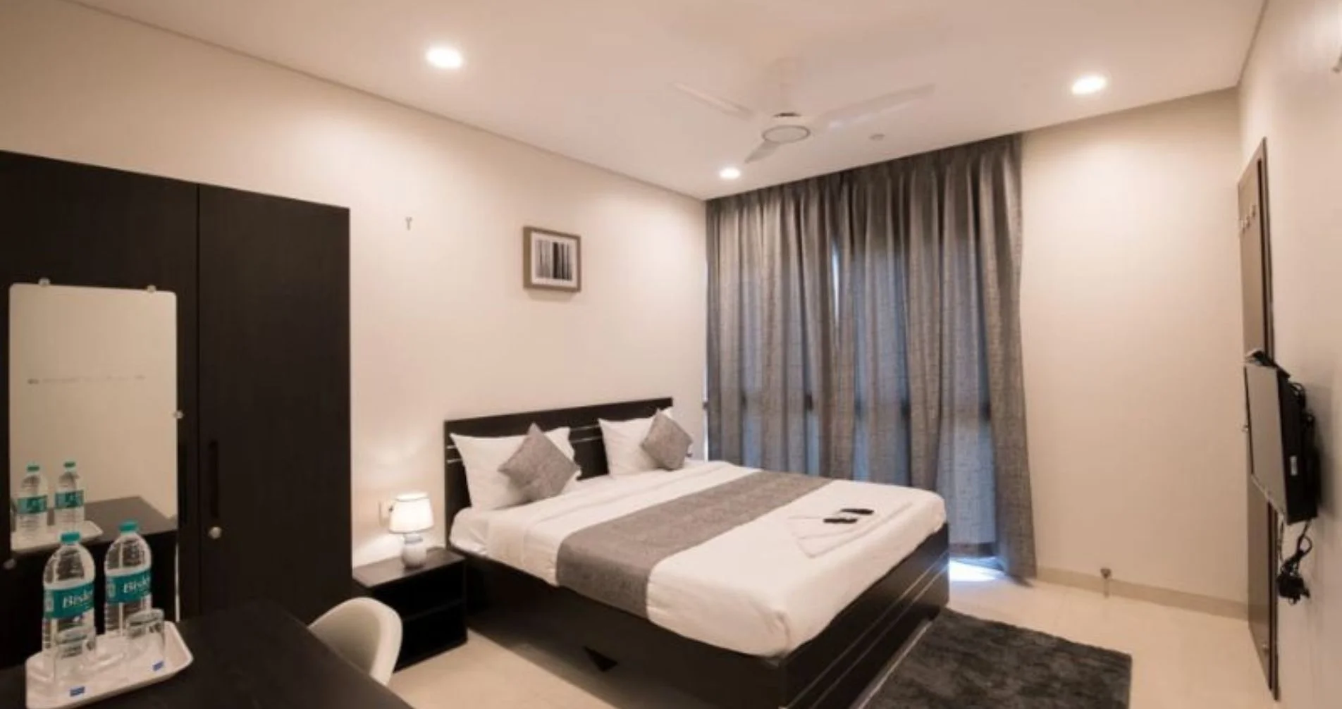 Spacious bedroom with modern interiors at Eon Homes, Hinjewadi