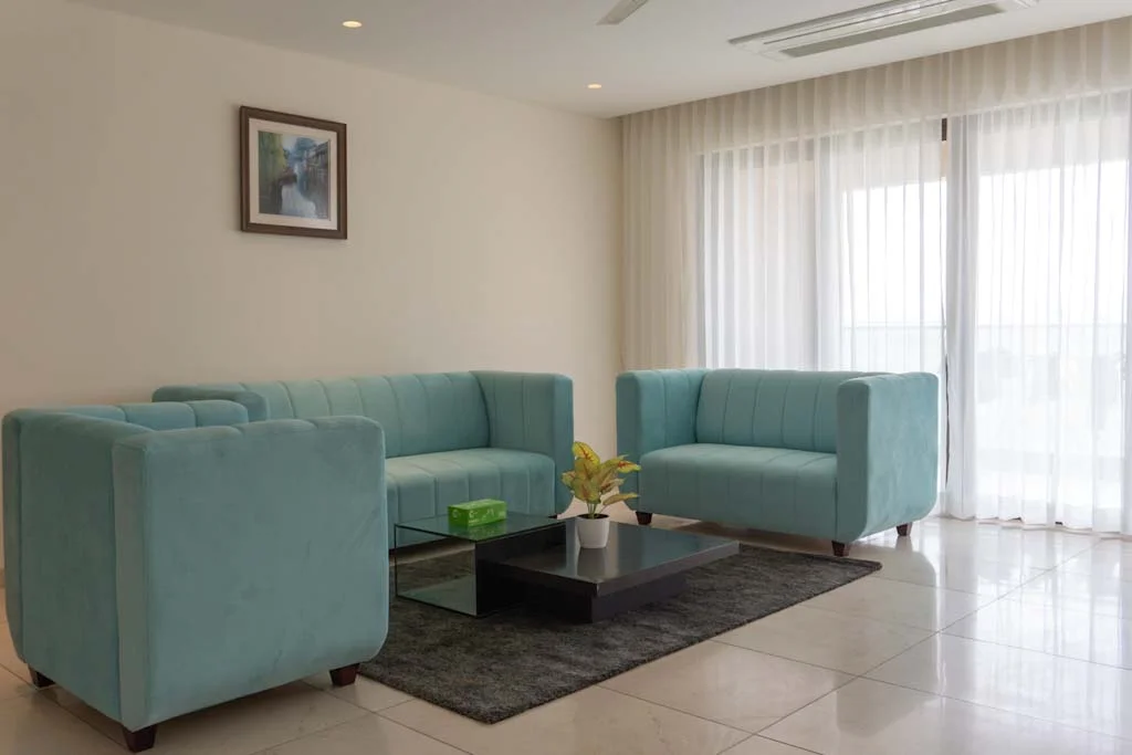 Modern furnished living space at EON Waterfront corporate apartment in Kharadi, Pune